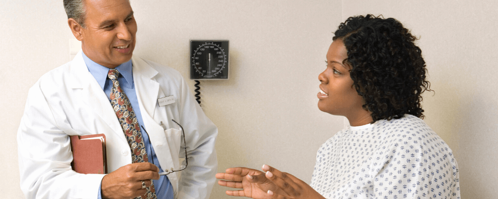 woman talking with doctor about bladder issues
